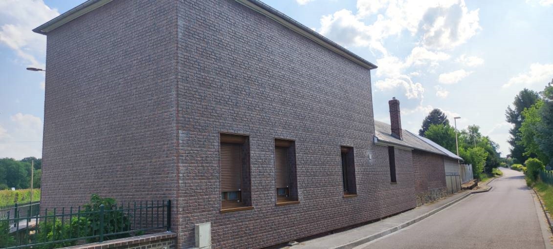 Installation d'une isolation thermique par l'extérieur à La Haye Malherbe